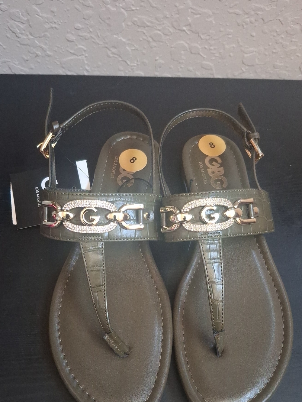 GBG Los Angeles Olive Green T-Strap Sandals with Gold Chain Emblem